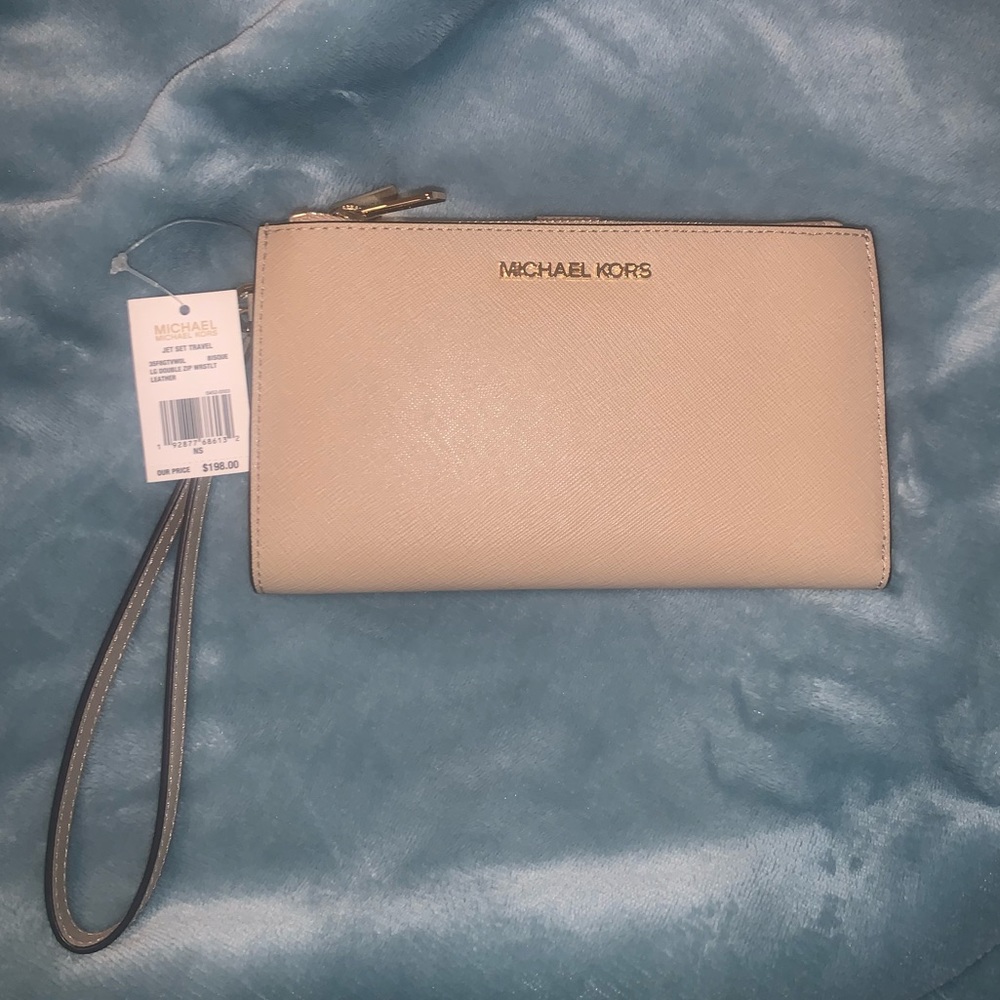 Michael Kors large double zip wrislet. Jet set travel collection